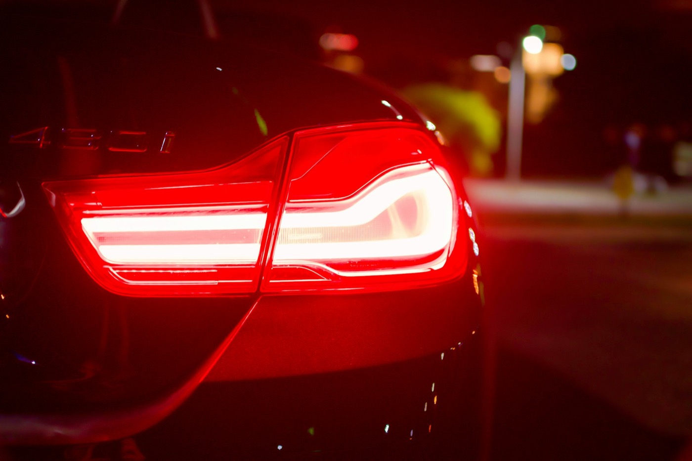 The red tail light of a car seen close up