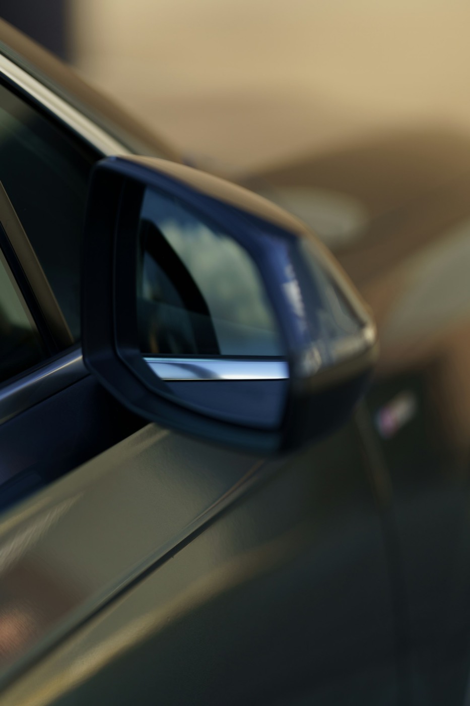 A car side mirror seen from the driver&rsquo;s seat
